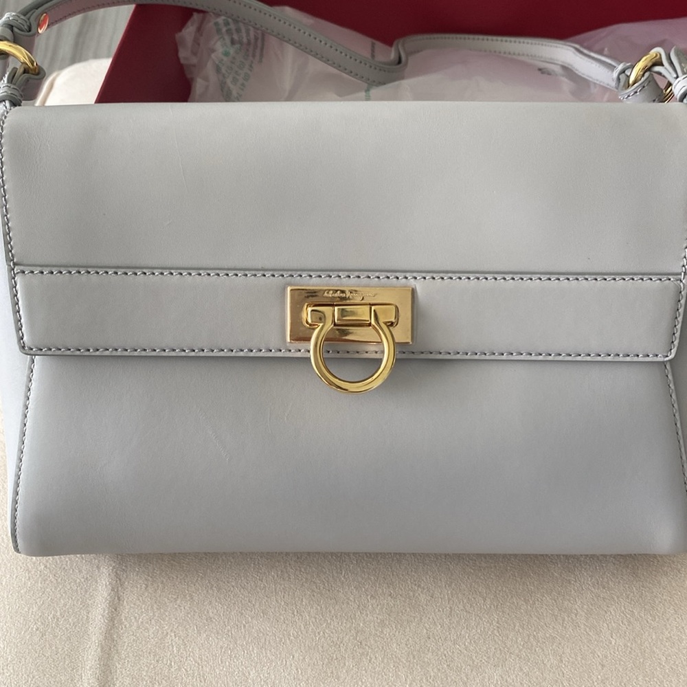 NWT Salvatore Ferragamo bag with gold hardware. Comes with box, dust bag